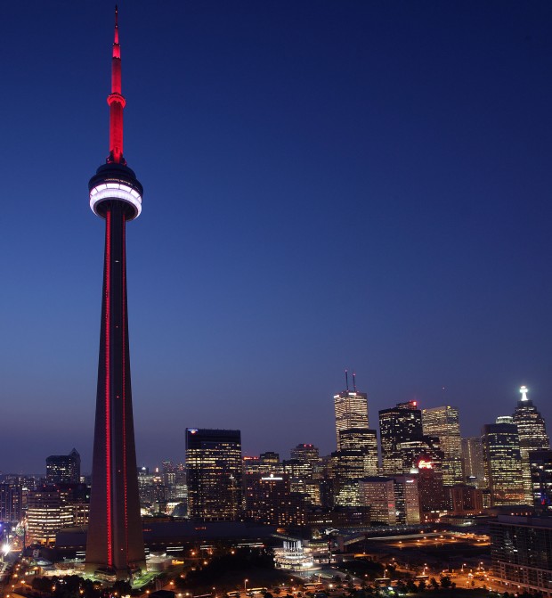 At sunset Thursday, the architectural illumination of the CN Tower dramatically transformed the Toronto night skyline during a celebration premiering its new innovative LED lighting system and kicking off Canada Day weekend. (CNW Group/CN Tower)